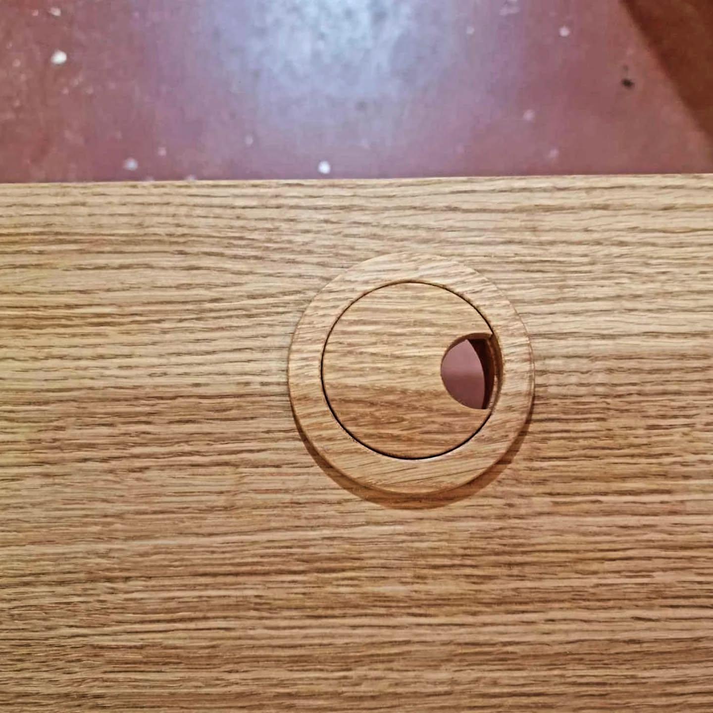 Oak cable opening in the desk